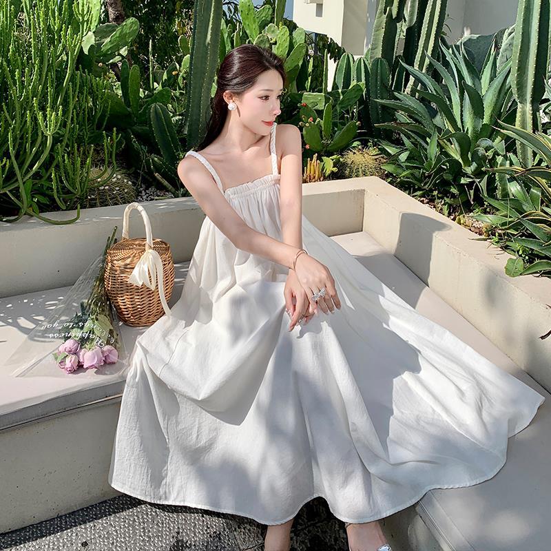 2025 White super fairy vacation travel hand-woven twist cotton and linen super pendulum niche retro suspender loose dress