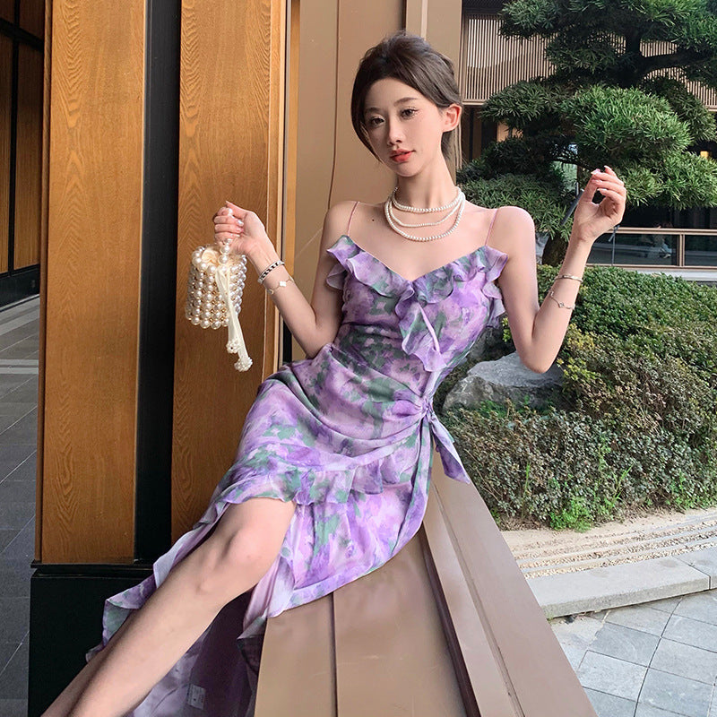 2025 Hong Kong style printed fungus edge suspender skirt women's summer new pure desire temperament waist thin holiday fishtail dress