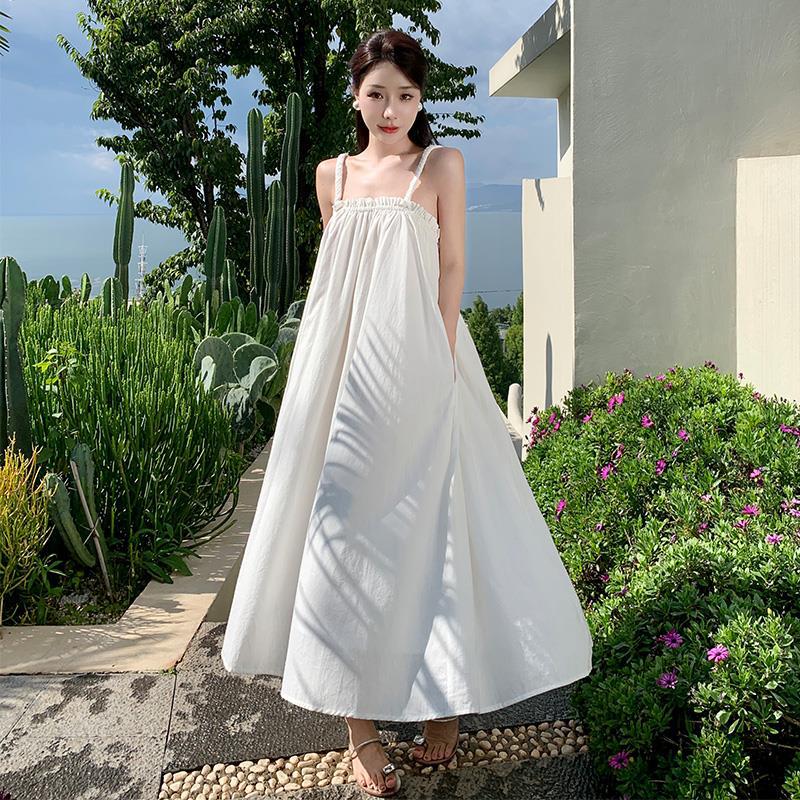 2025 White super fairy vacation travel hand-woven twist cotton and linen super pendulum niche retro suspender loose dress