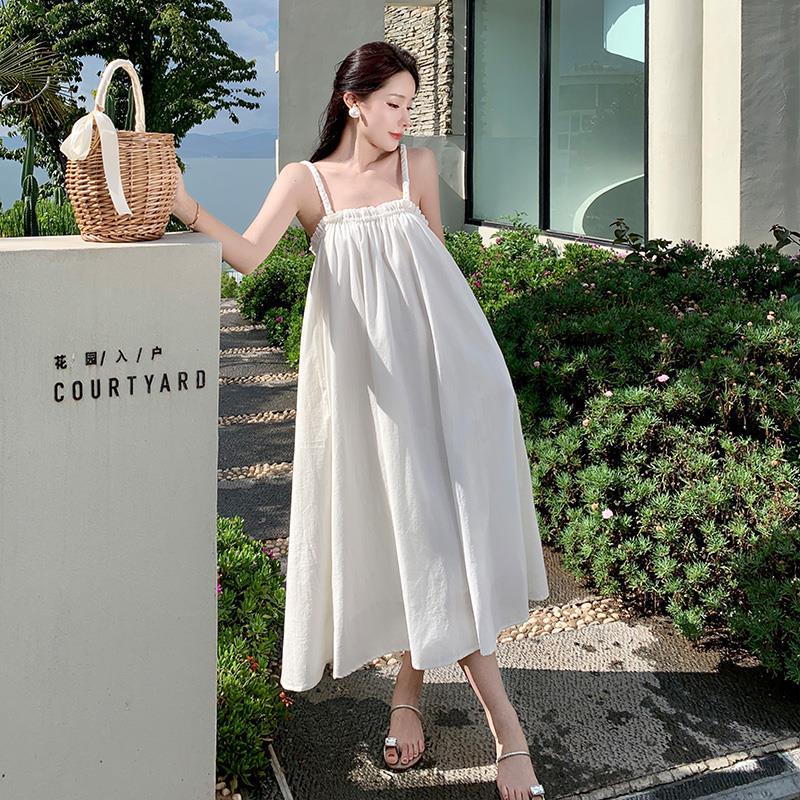 2025 White super fairy vacation travel hand-woven twist cotton and linen super pendulum niche retro suspender loose dress