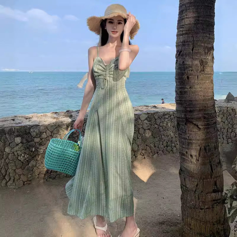 2025 Seaside photo clothes super fairy light green print suspender dress Yunnan seaside vacation backless slim dress