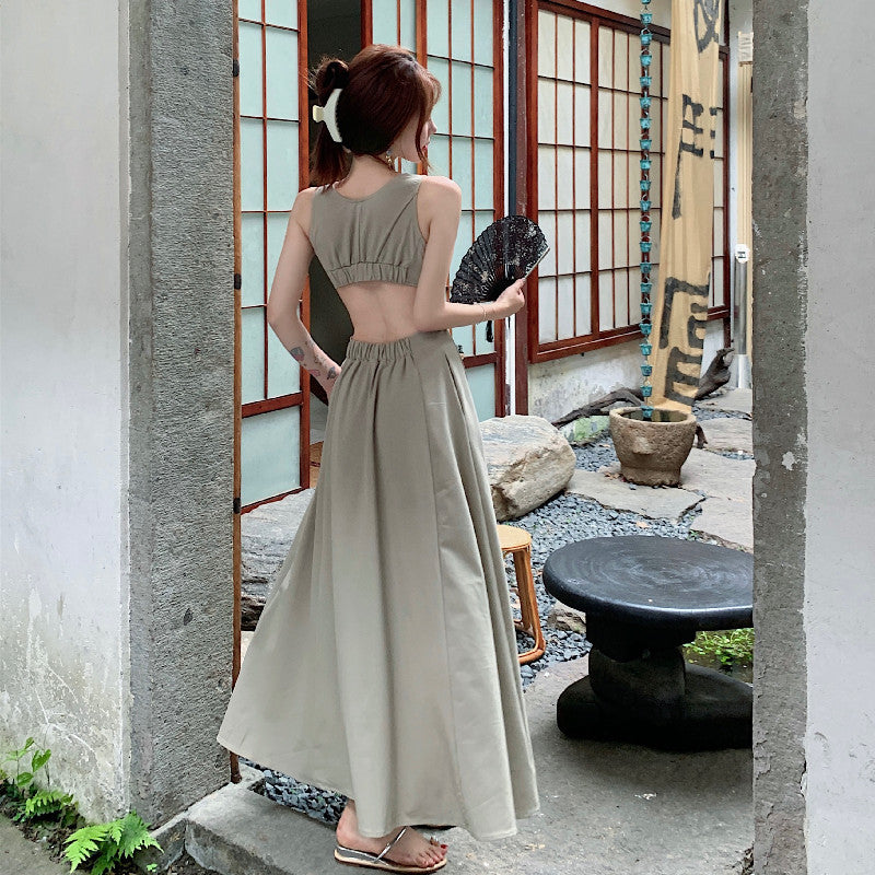 2025 V-neck waist-exposed empty sexy vest dress women's high-end sense summer new large skirt floor-mopping dress