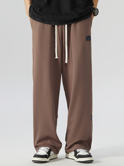 Plus Size Men's NYG Graphic Print Drawstring Pants - Comfortable Loose Fit, Versatile Outdoor Sports Pants for Spring and Fall Seasons, Perfect for Casual Wear