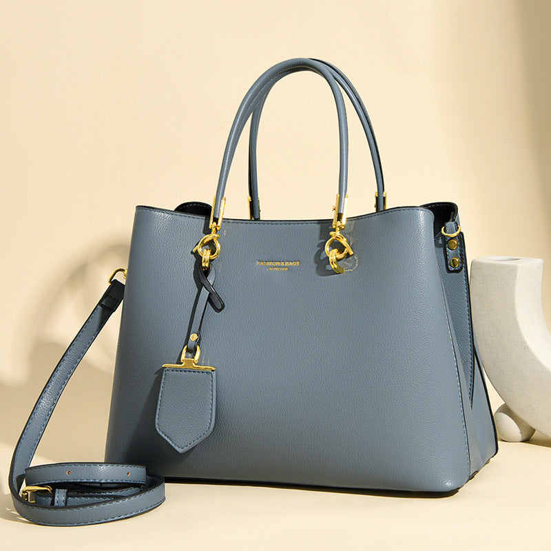 2025 Bag Autumn Women's popular Stylish Simple Handbag High Sense Large Capacity Tote Bag Commuter Shoulder Bag