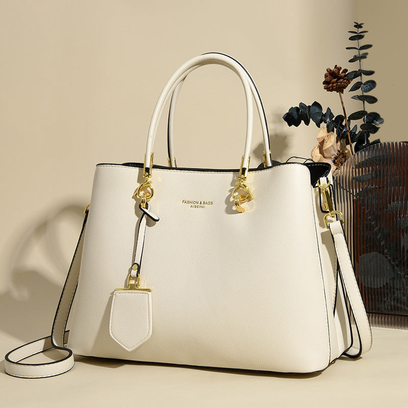 2025 Bag Autumn Women's popular Stylish Simple Handbag High Sense Large Capacity Tote Bag Commuter Shoulder Bag