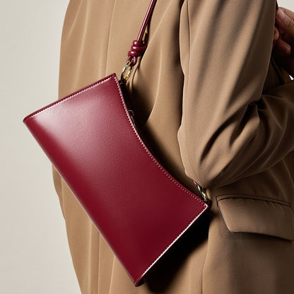 2025 Baguette underarm women's bag popular new summer high-end commuting shoulder bag textured leather bag