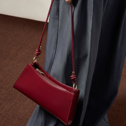 2025 Baguette underarm women's bag popular new summer high-end commuting shoulder bag textured leather bag