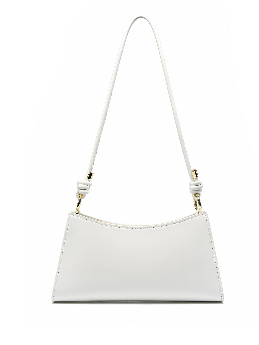 2025 Baguette underarm women's bag popular new summer high-end commuting shoulder bag textured leather bag