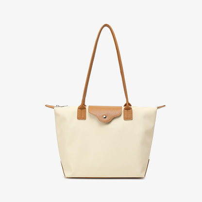 2025 Korean version contrasting color college style large-capacity commuting waterproof computer single shoulder tote bag women's texture large bag dumpling bag