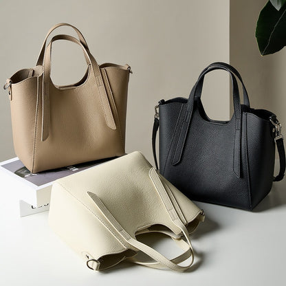 2025 The first layer of cowhide women's bag commuter texture hand bag popular new trend shoulder messenger bag