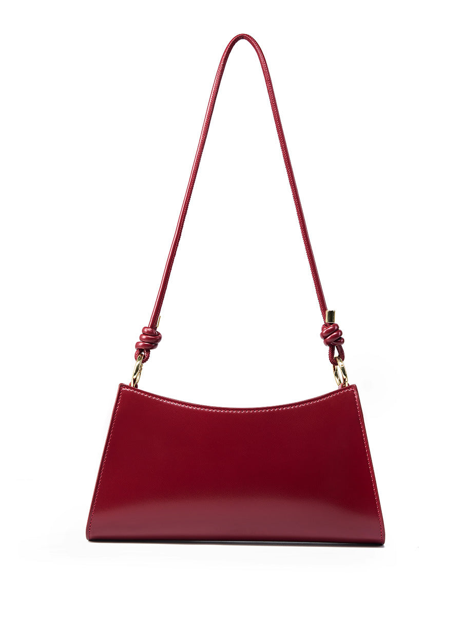2025 Baguette underarm women's bag popular new summer high-end commuting shoulder bag textured leather bag