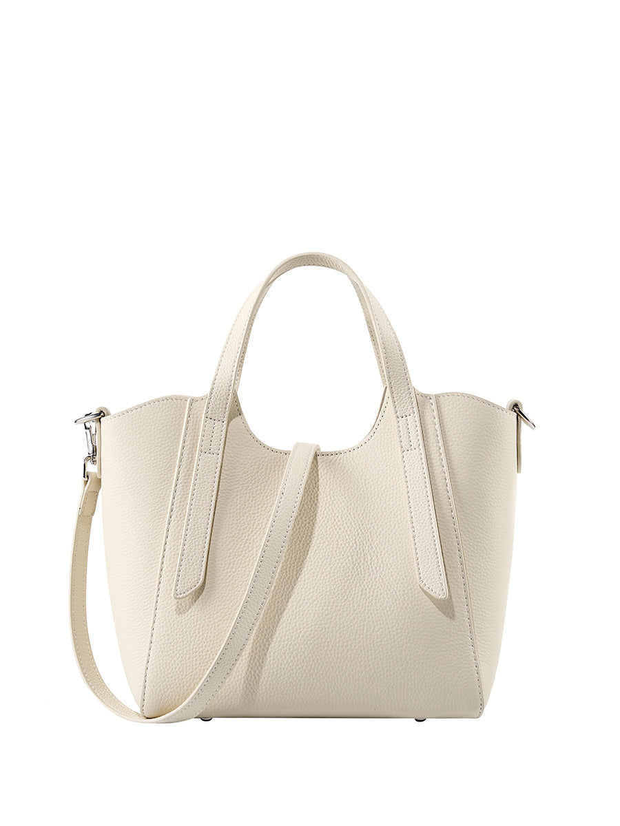2025 The first layer of cowhide women's bag commuter texture hand bag popular new trend shoulder messenger bag